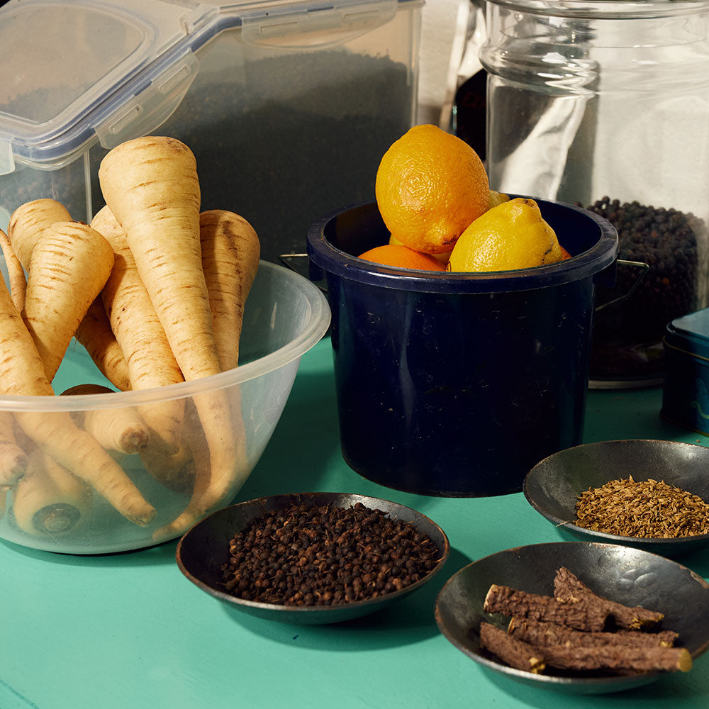 James Gin ingredient display. Featuring Parsnips, Lemons and botanicals.