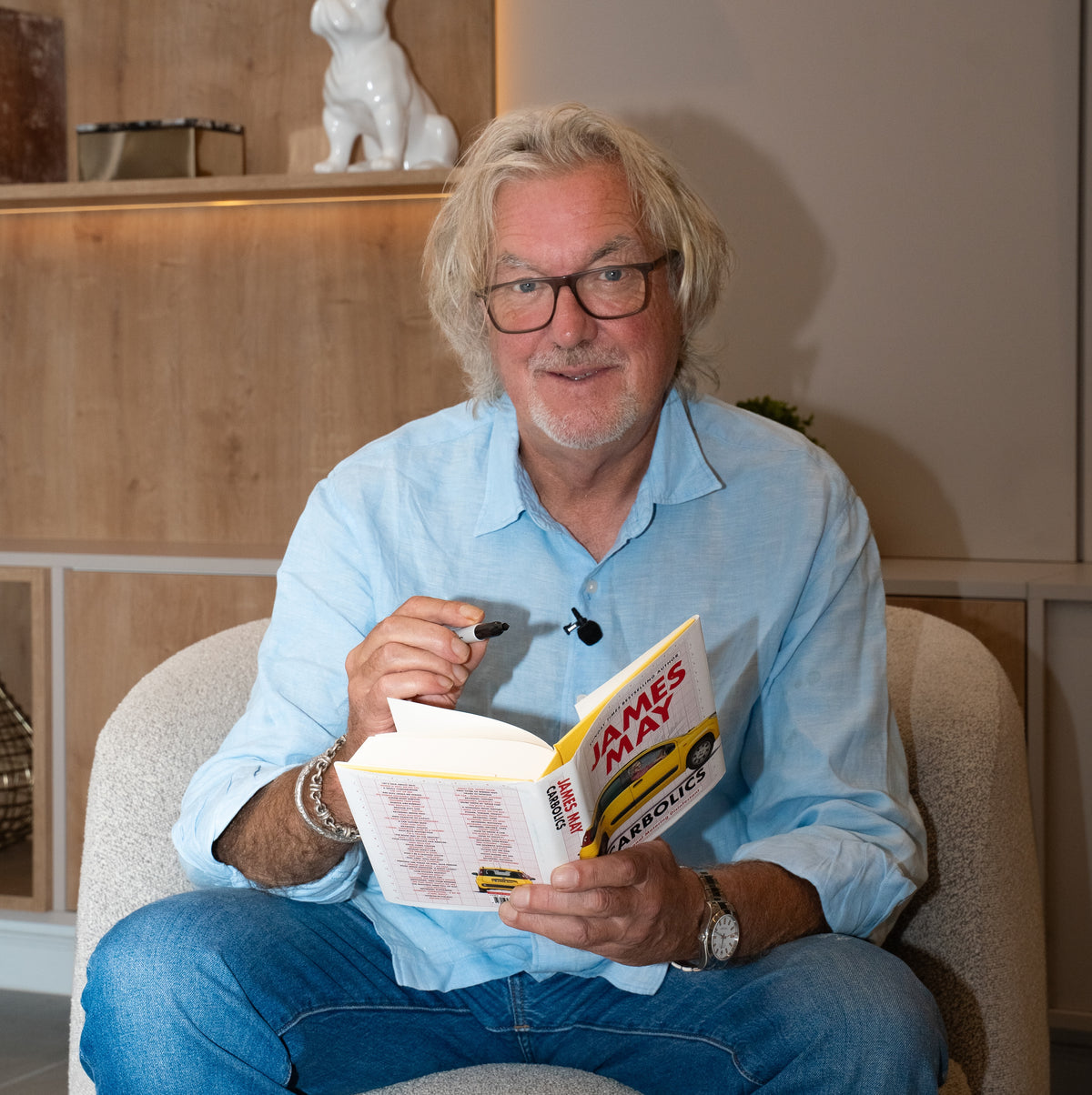 James May holds his book 'Carbolics' for the Carbolics book and gin bundle